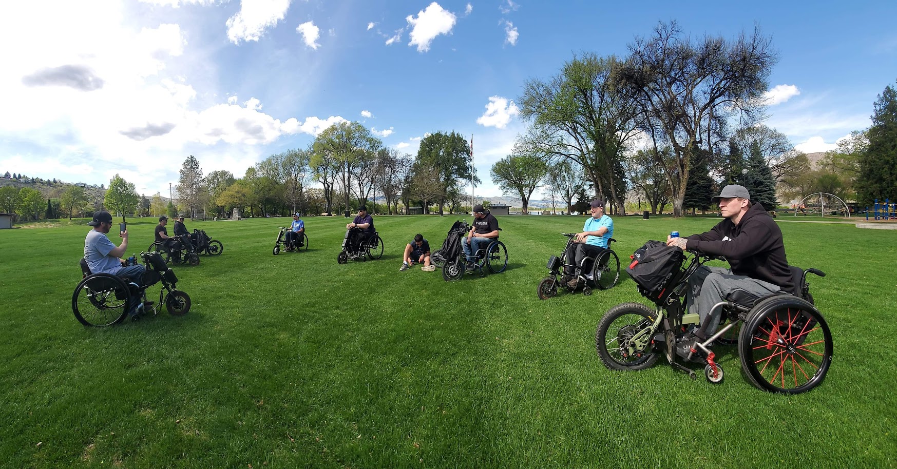 Electric handcycle attachment mounted to a wheelchair