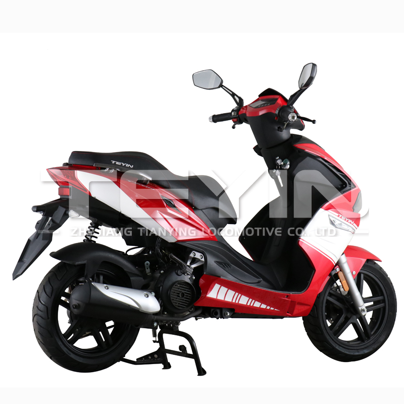 Rear view of the scooter showing exhaust and rear suspension