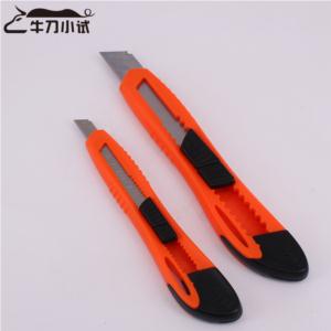 Retractable utility knife showing ergonomic design and blade mechanism