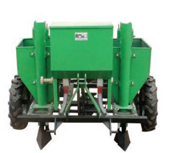 A robust tractor-mounted potato planter in a field setting