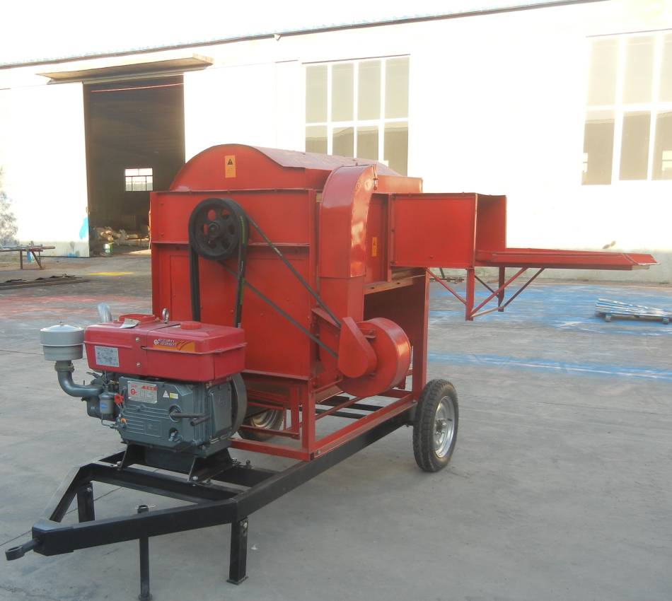 Side view of the 5TD series grain thresher showing the engine and chassis