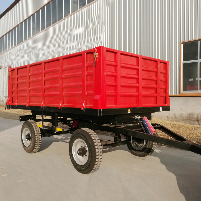 Red agricultural trailer with steel frame