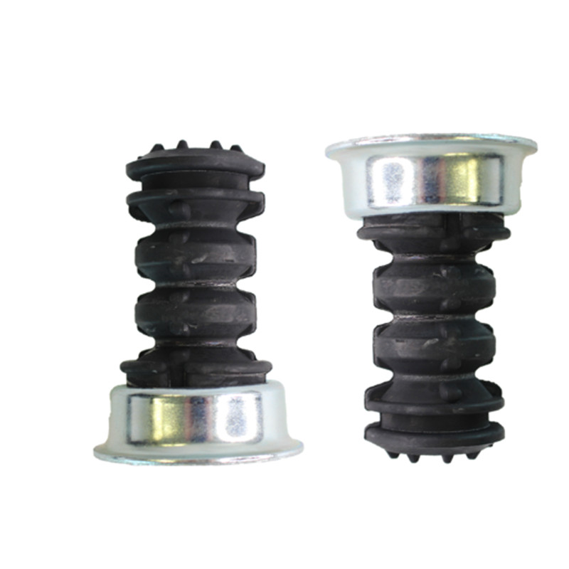 Close-up of the strut bumper and bellows kit components
