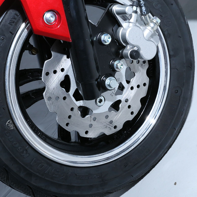 Close up of front wheel and disc brake
