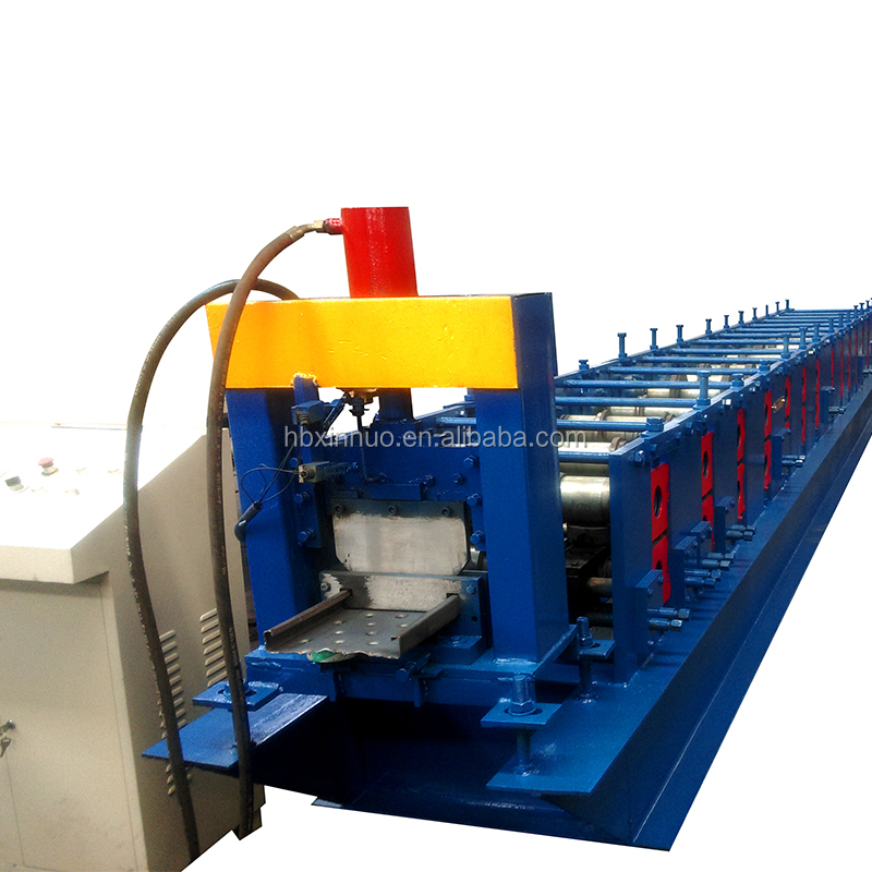 Side profile of the roll forming machine showing hydraulic components