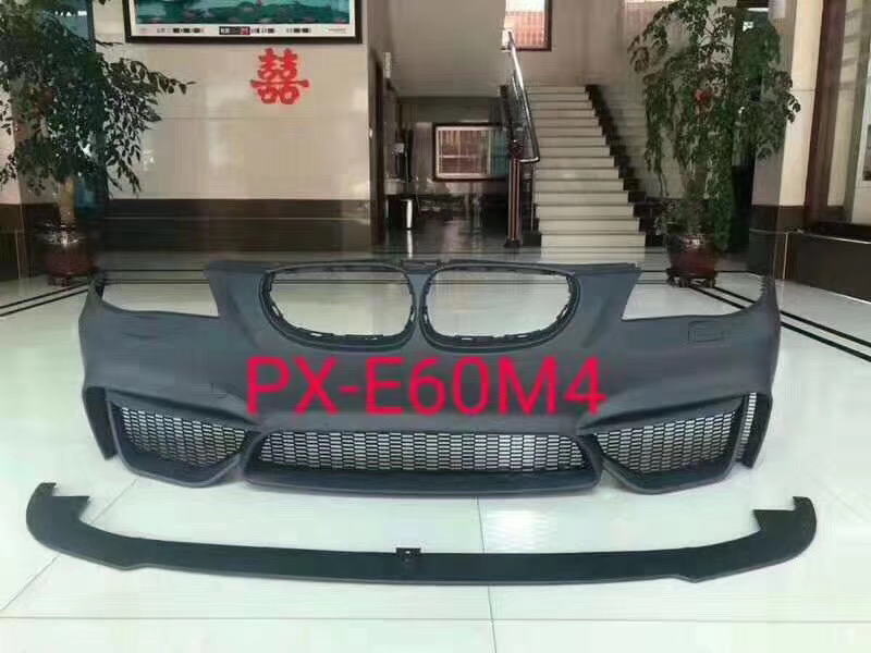 Automotive Front Bumper with Integrated Fog Light Housings