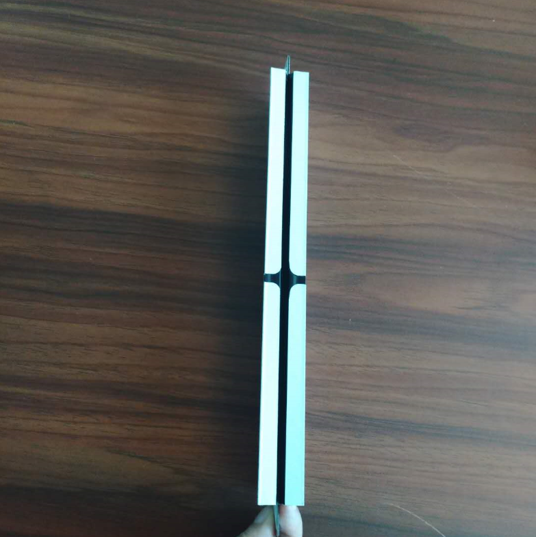 Component from the production line showing guide rail or extrusion
