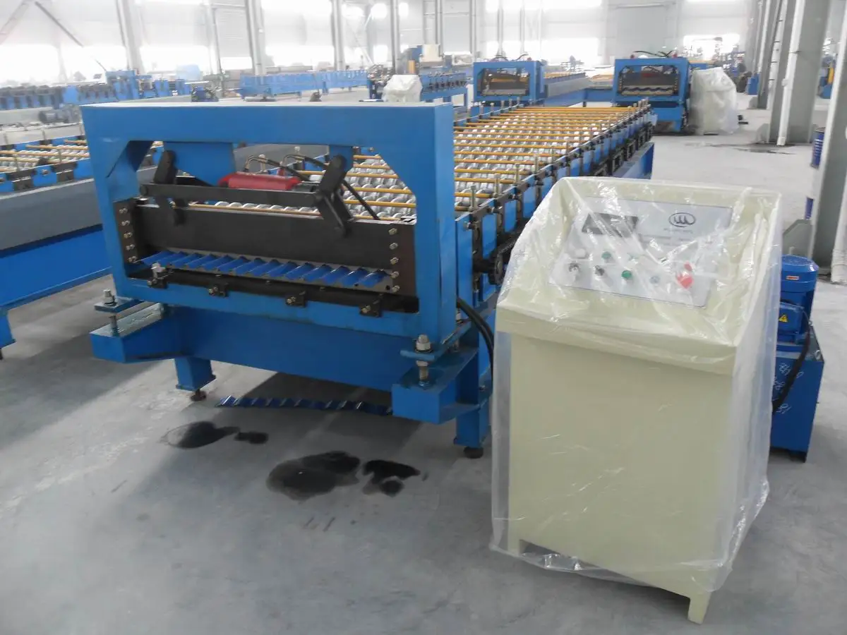 Close up of the control panel and hydraulic system of the industrial roll forming machine