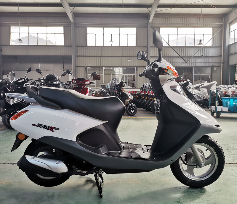 Close up of the scooter handlebar and grip area.
