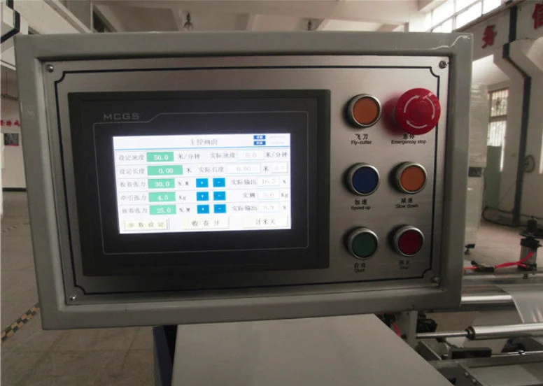 Control panel interface showing real-time speed, length, and tension parameters.