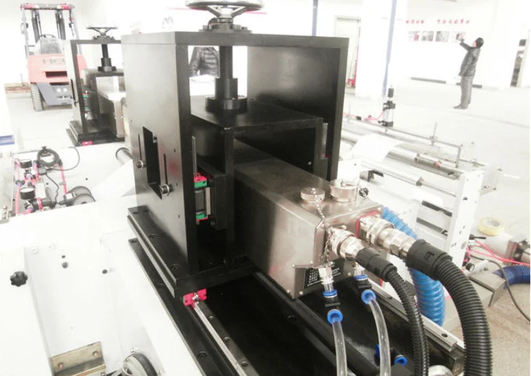 Robust frame and linear guide system for the laser perforation unit.