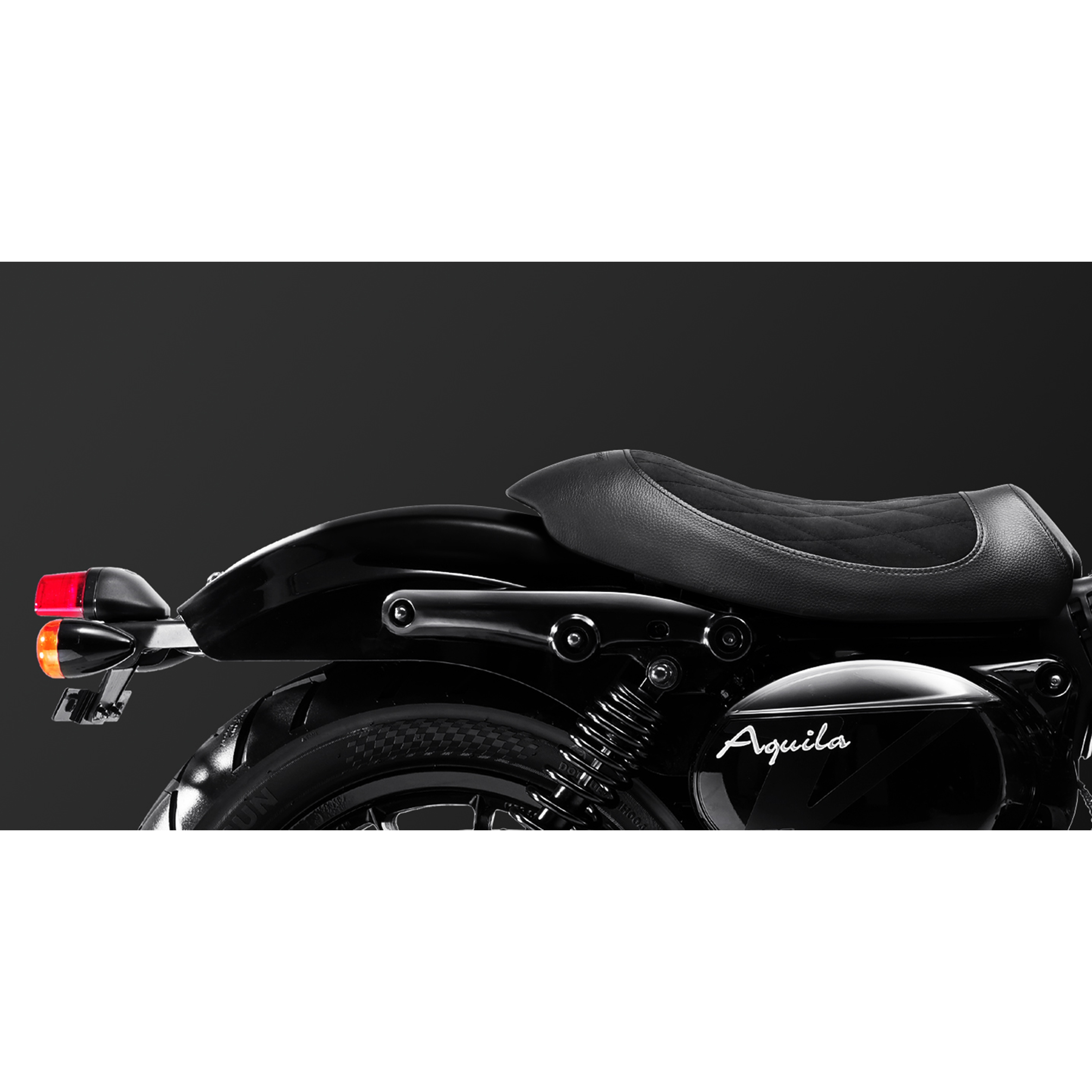 Rear view of the motorcycle showing the seat and tail