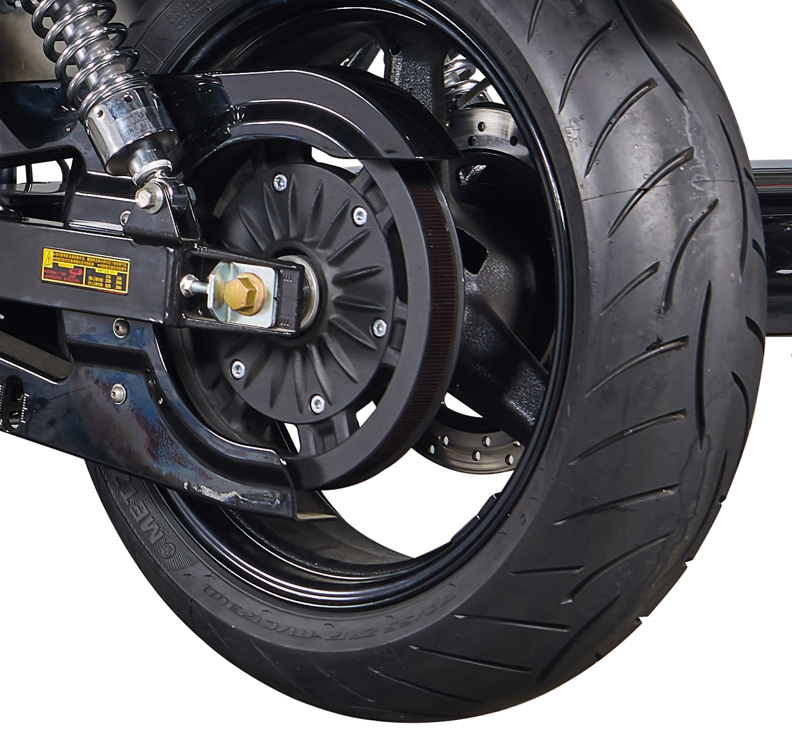 Close-up of the rear wheel assembly featuring belt drive and disc brake.