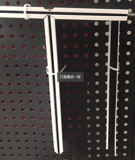 Finished gypsum board ceiling keel product featuring white frame and black accents