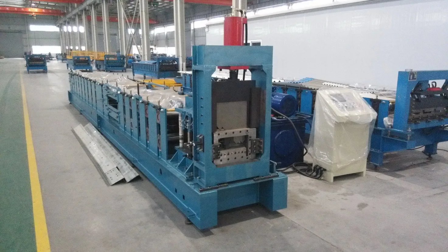 Close-up of the roll forming stations and control panel