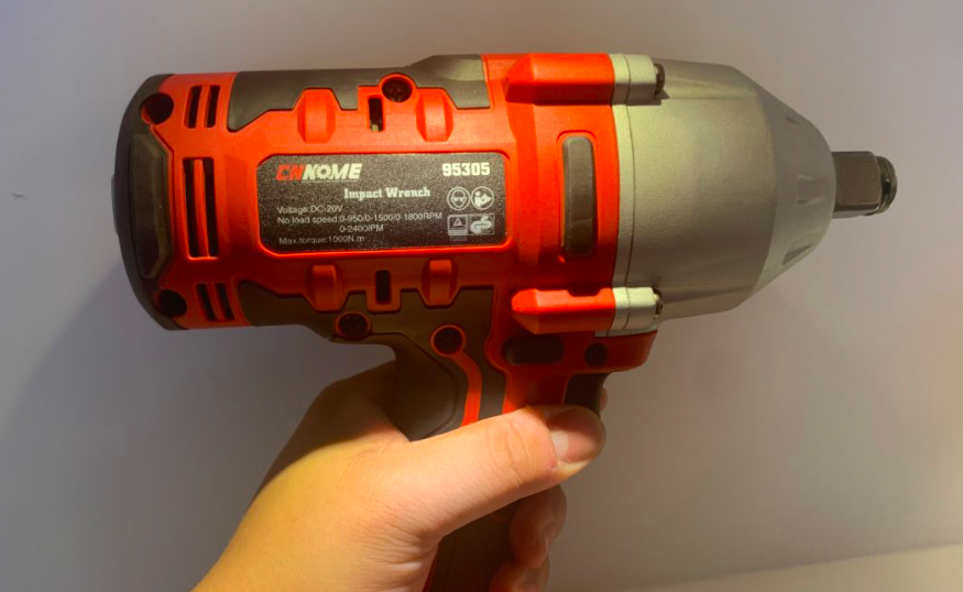 Close up of the 20V brushless impact wrench showing speed settings and torque specifications.