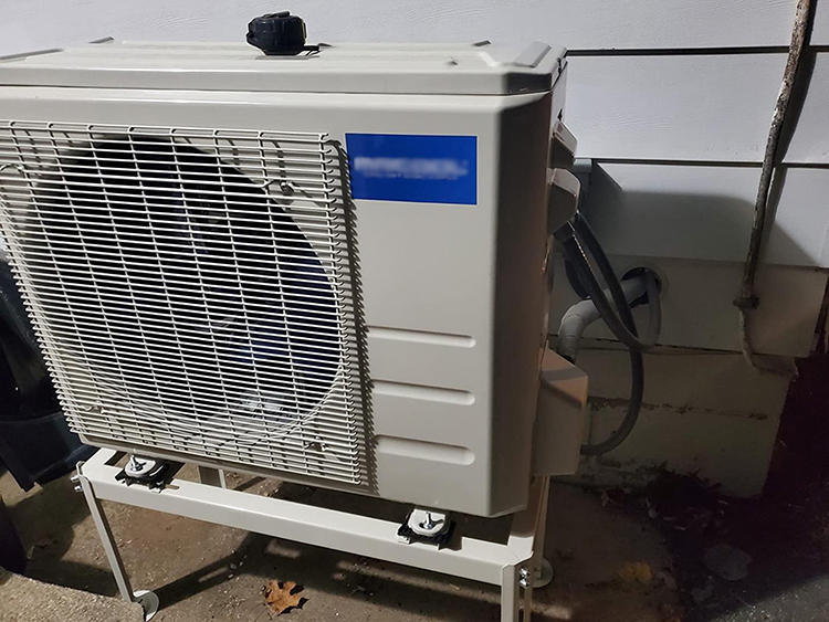 Outdoor installation of AC ground bracket