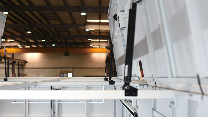 Side profile of the laser cutting machine showing the enclosure