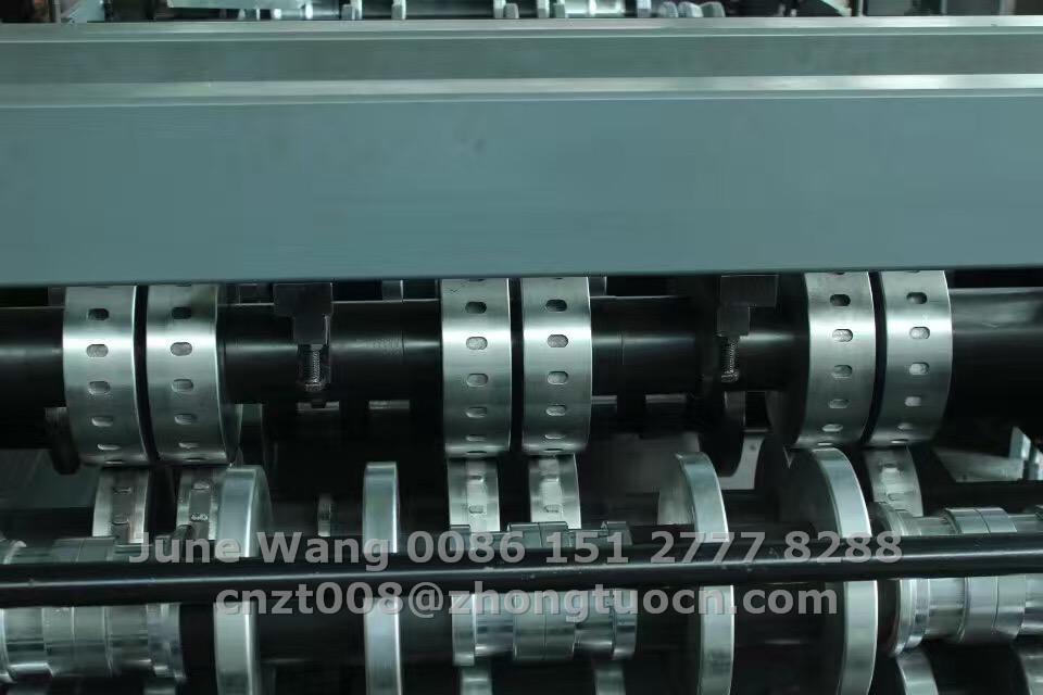 Close up of the machine rollers and mechanical components