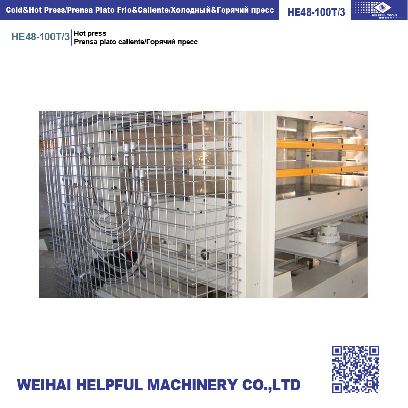 Full view of the industrial hot press with safety cage