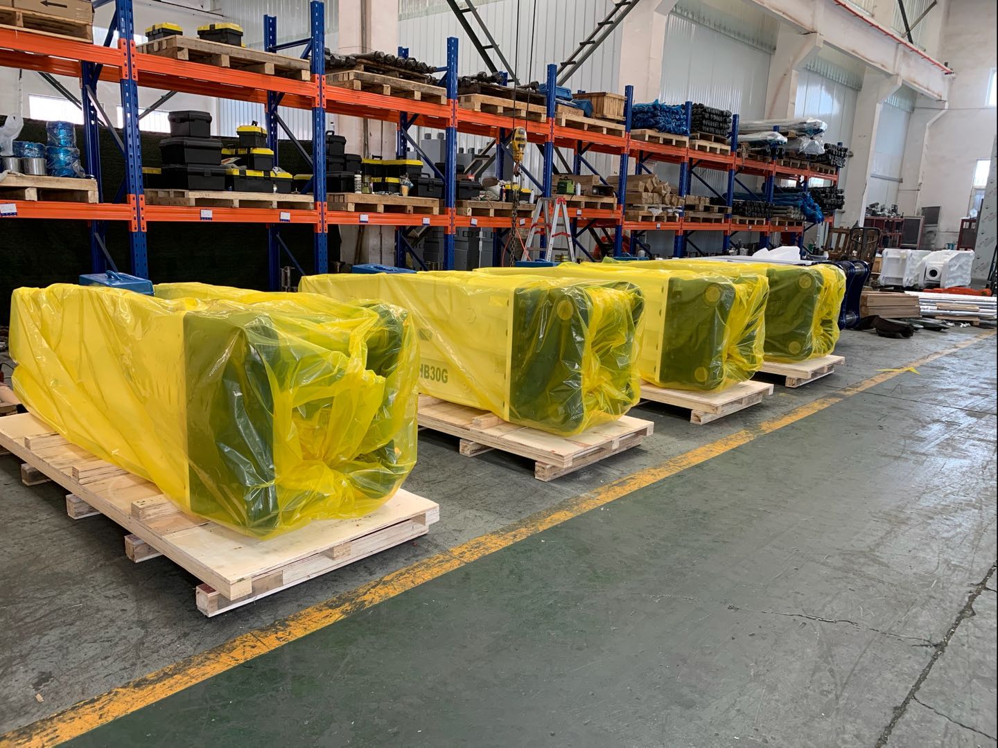 Packaged hydraulic rock breaker units ready for shipment