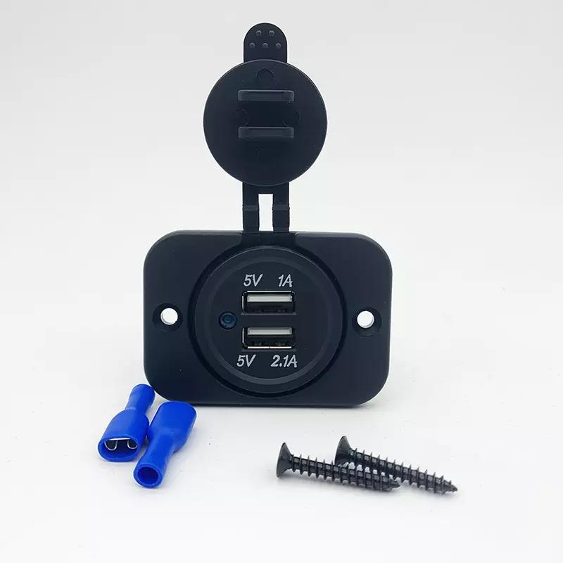Dual USB car charger socket installed in a panel