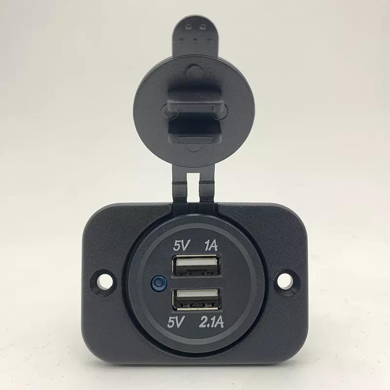 Dual USB charging socket with protective cap