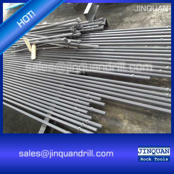Steel bar with forged chisel bit