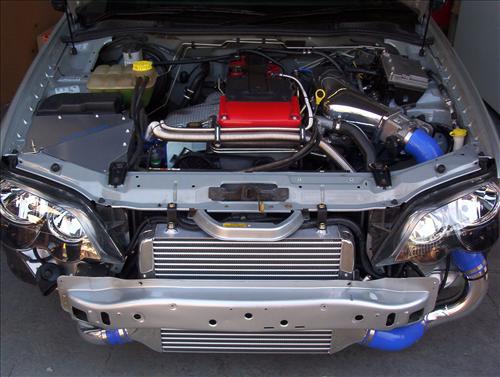 High-performance bar and plate intercooler core assembly