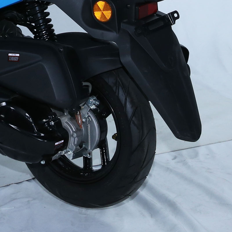 Rear view of the delivery scooter showing wheel and suspension