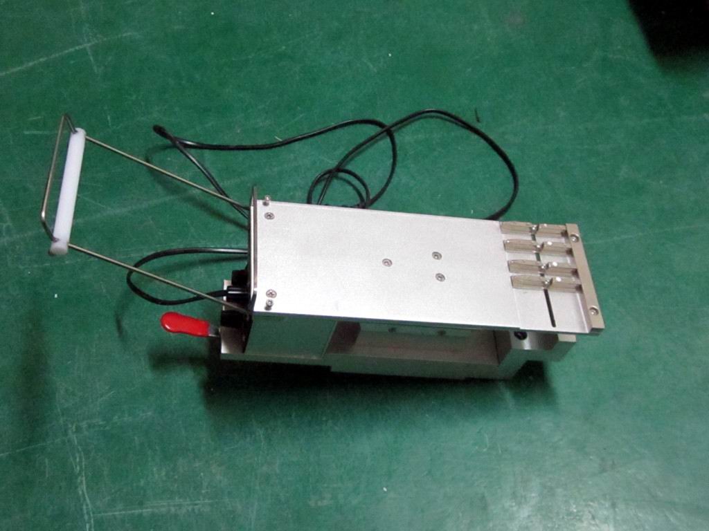 Automated Stick Feeder for Electronic Assembly