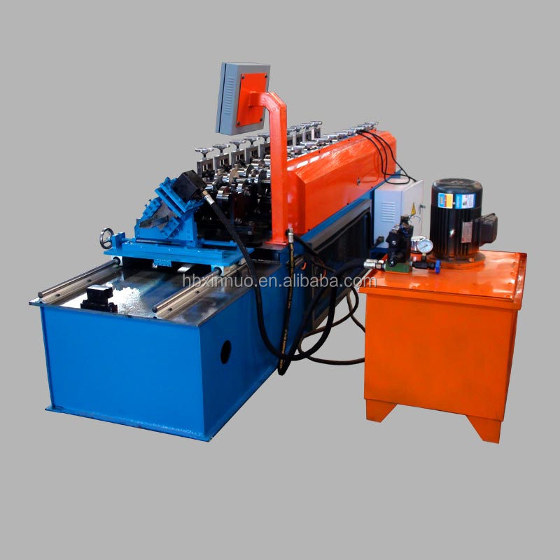 Side view of the keel roll forming machine showing hydraulic pump and motor