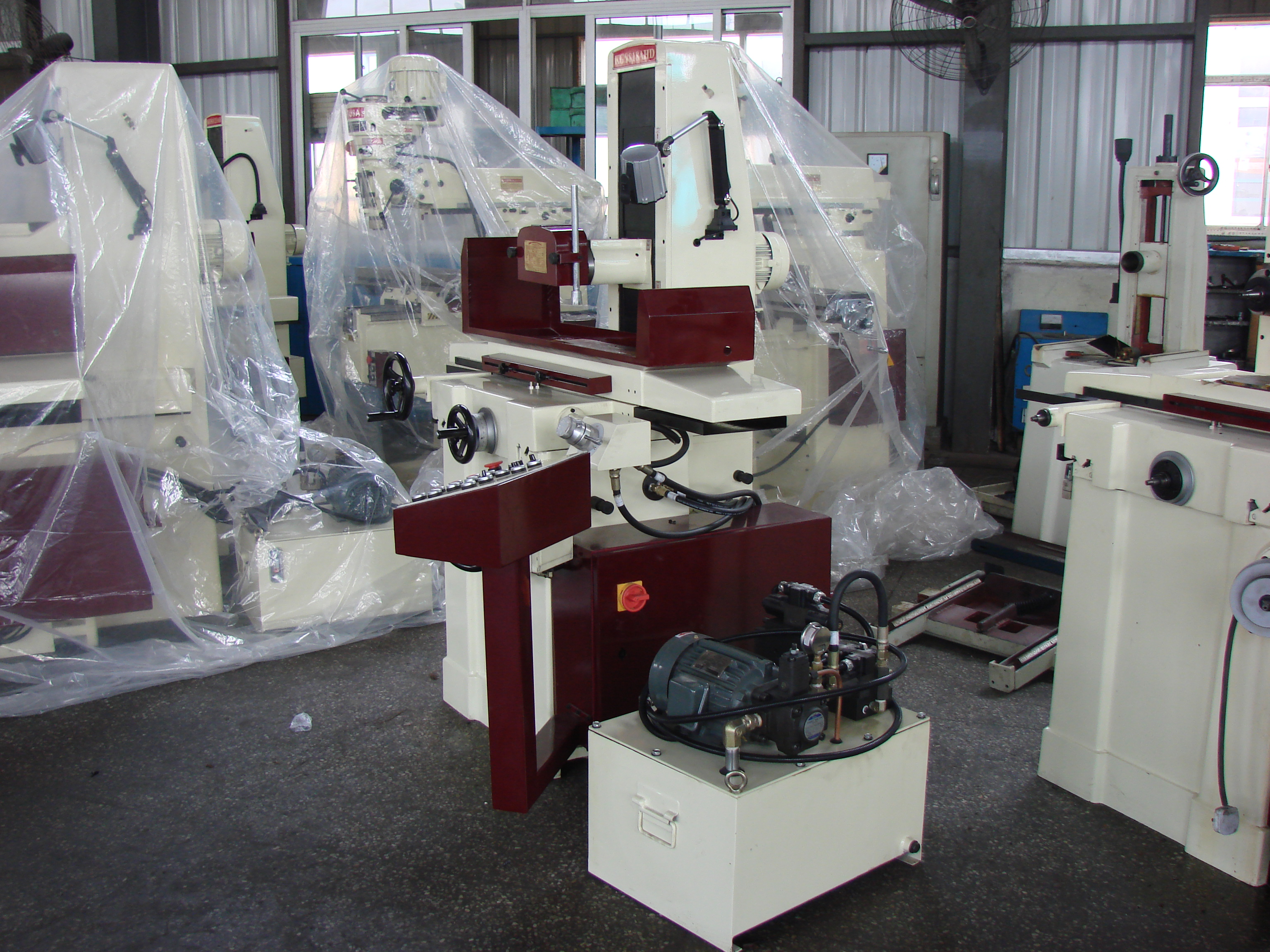 Close up of grinding machine control panel and structure