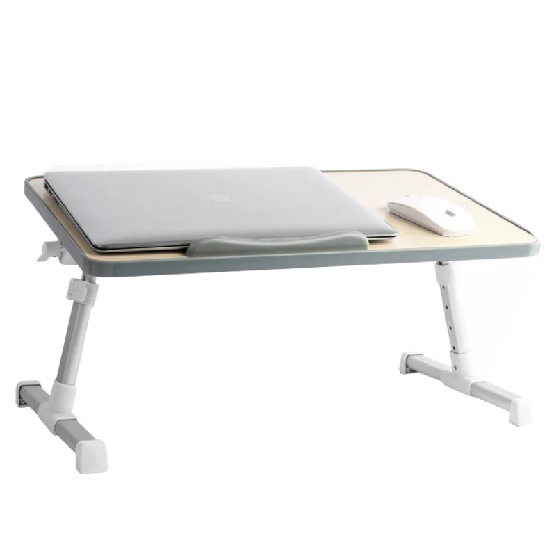 Adjustable laptop bed table on a couch