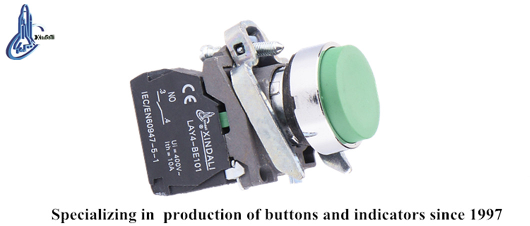 Close up of the metal push button switch showing contact terminals
