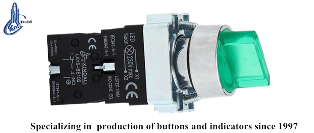 Close up of the 3-position selector switch with LED indicator