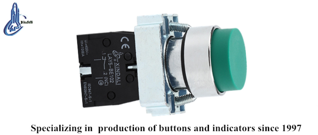 Close up of the latching push button switch