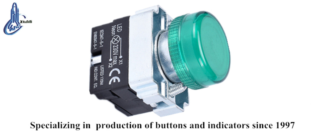 Close up of the illuminated push button switch showing certification markings