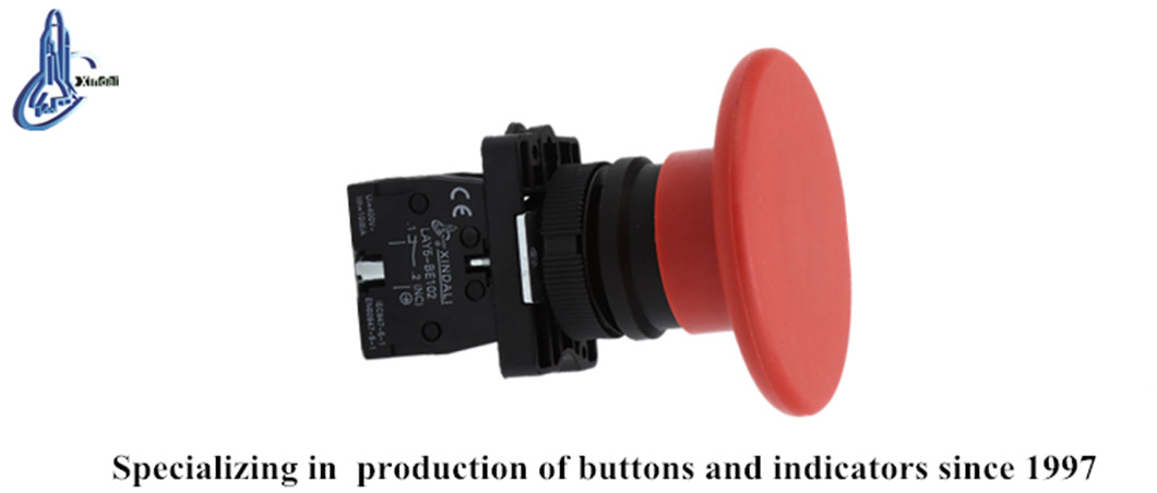 Close up view of the red mushroom head pushbutton switch