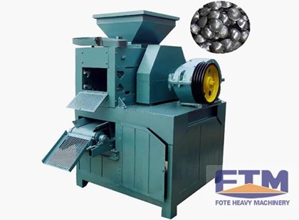 Lignite briquetting machine showing the main processing unit and hopper