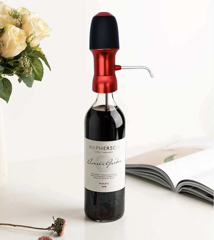 Portable electric wine aerator in use with a wine bottle