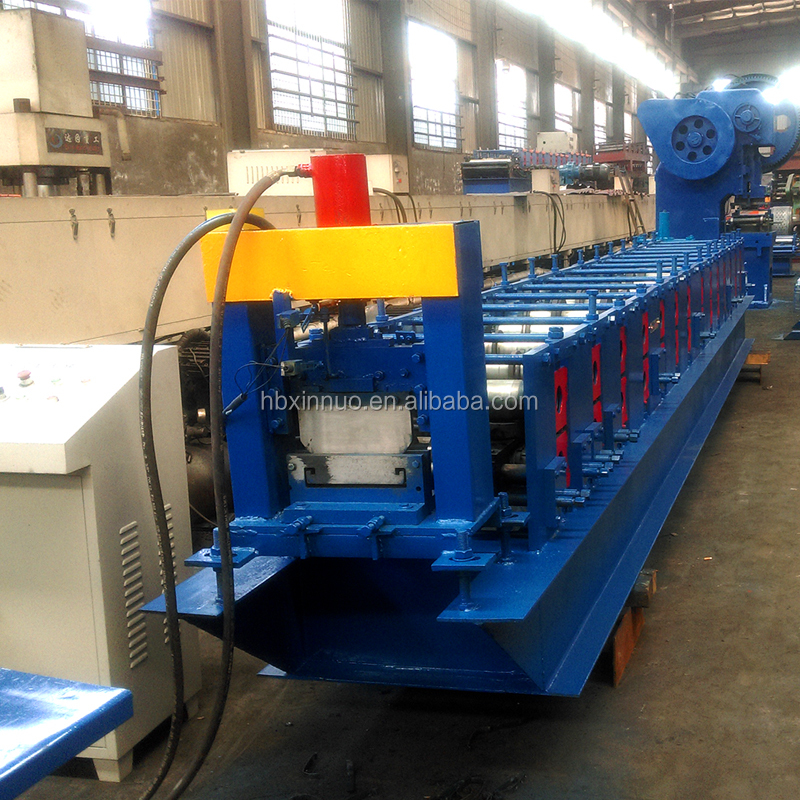 Side view of roll forming machine