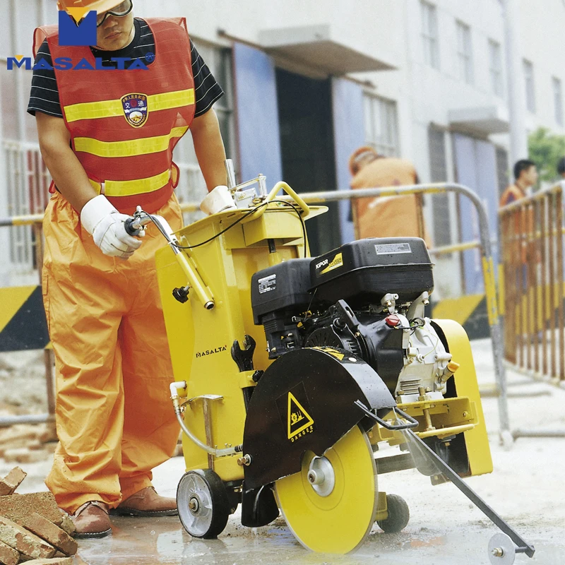 Close up of the floor saw blade guard and handle controls