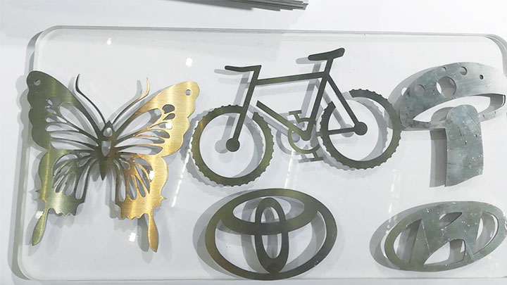Collection of laser-cut metal art pieces