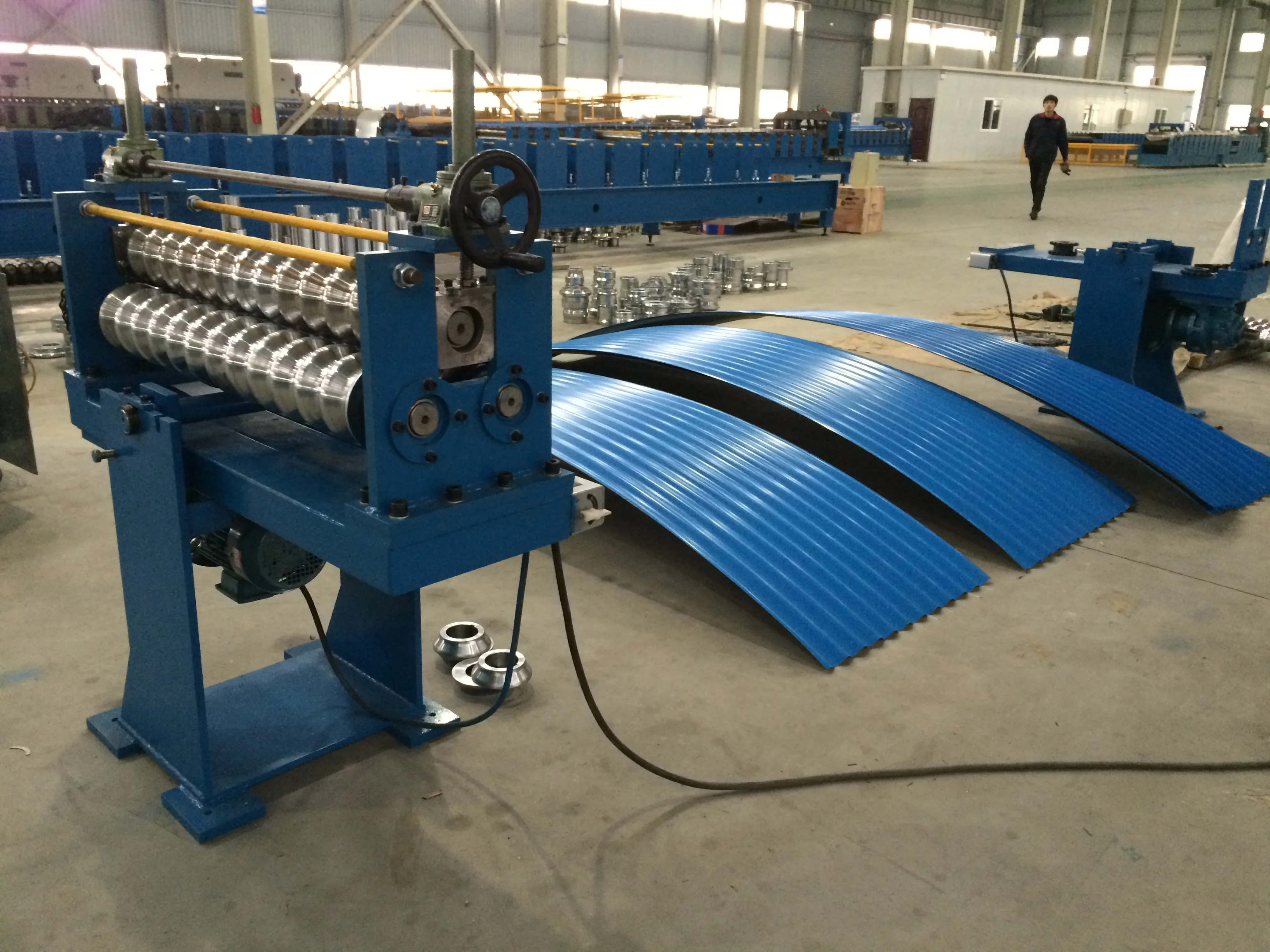 Close up of the manual adjustment wheel on the roll forming machine