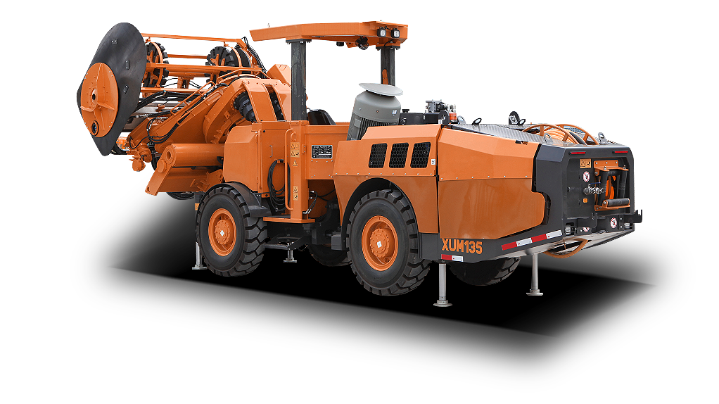 Drilling arm and boom assembly in operation
