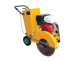Gasoline-powered tamping rammer in action on a construction site