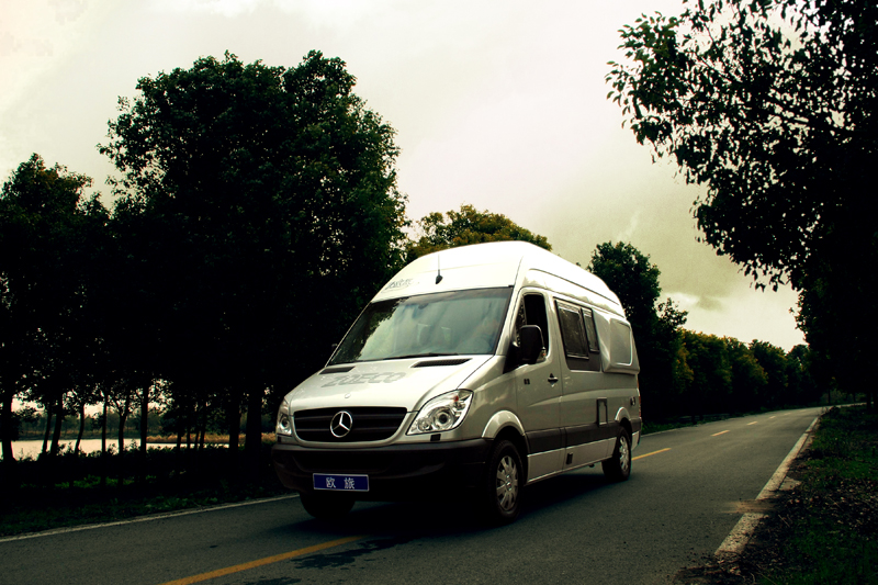 Silver Motor Caravan with Integrated Living Space