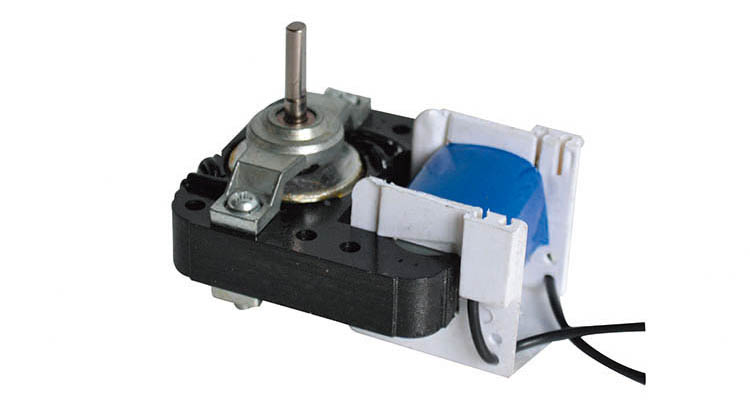 Compact AC motor for steaming and baking appliances