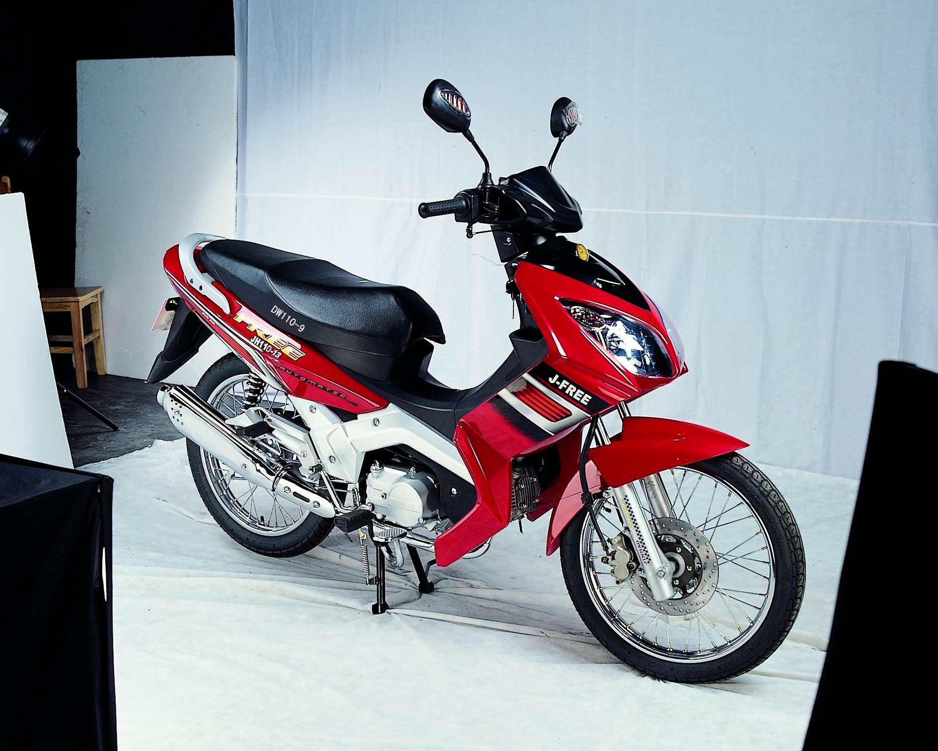 Red and Black Step-Through Motorcycle